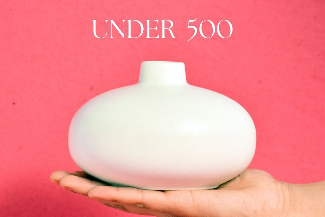 Quirky decorative vase under ₹500 for modern Indian home décor with unique playful design