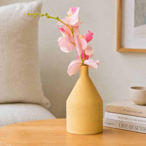 Elegant classic ceramic flower vase with red flowers for modern home décor