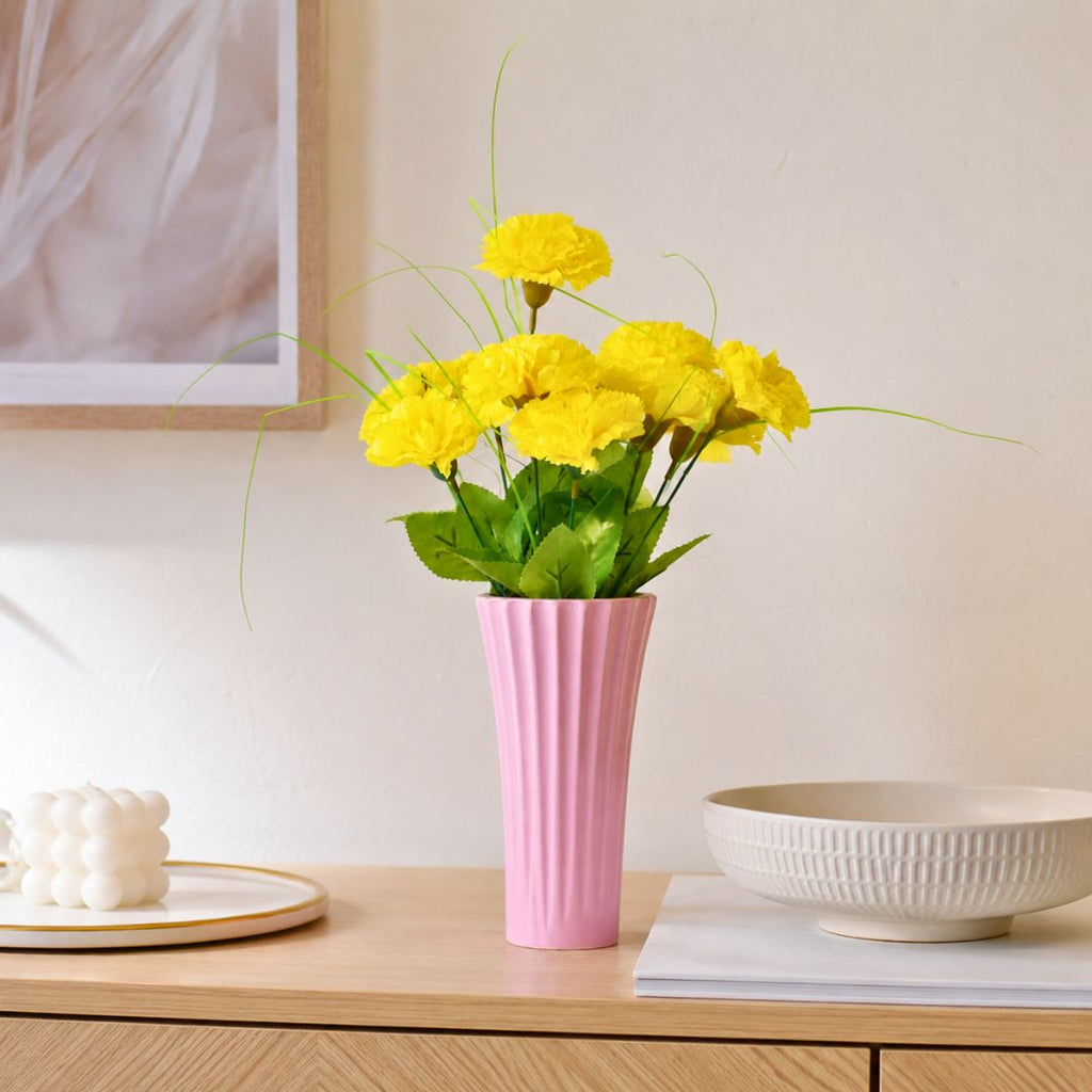 Sky Pink ribbed ceramic flower vase with yellow flowers for modern luxury home décor and contemporary interior styling in India
