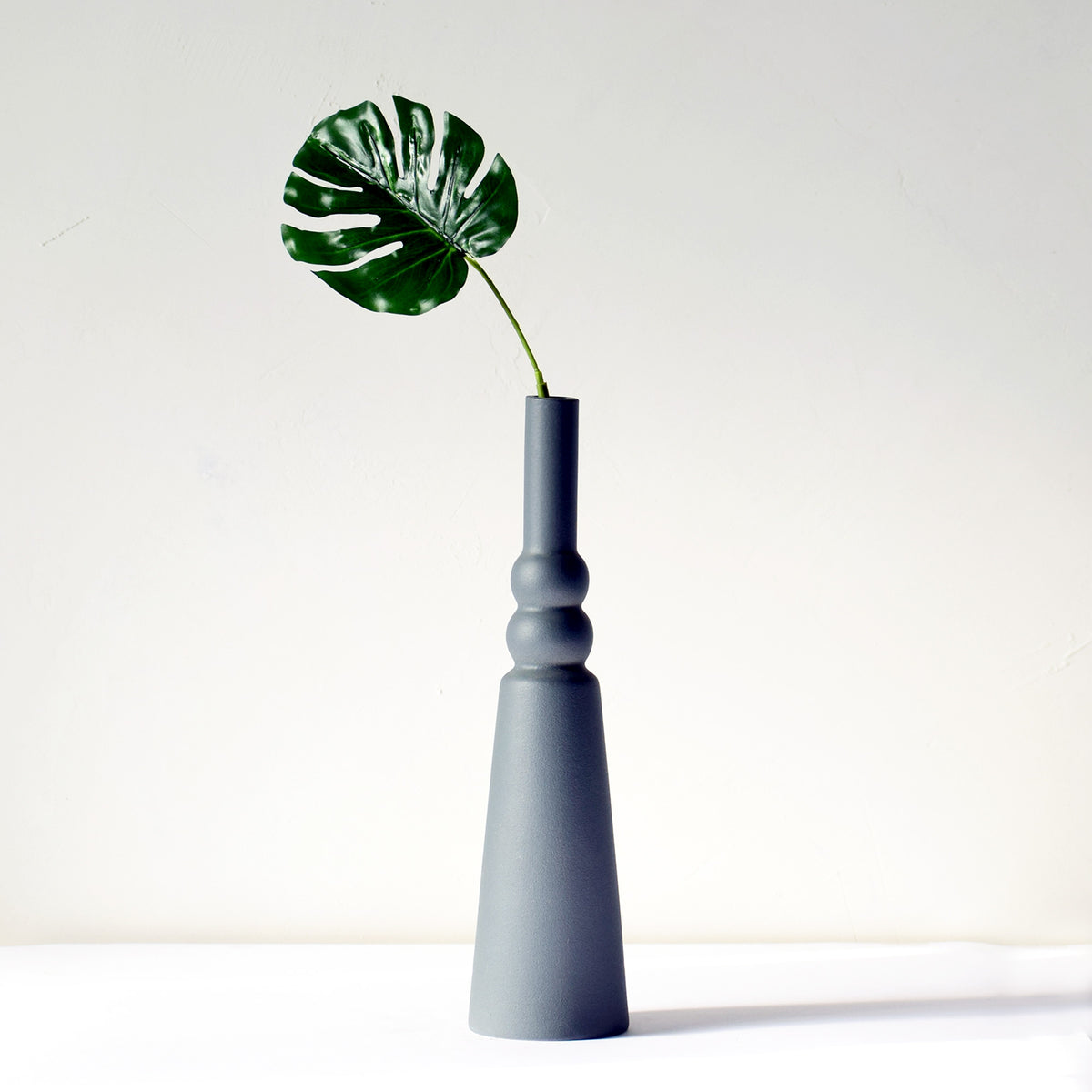 Handcrafted luxury ceramic flower vase with minimalist modern design for elegant home décor and contemporary Indian interiors