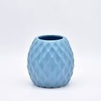 Delilah Cross modern ceramic vase with matte finish styled for luxury home décor with dried flowers in Indian interior setting