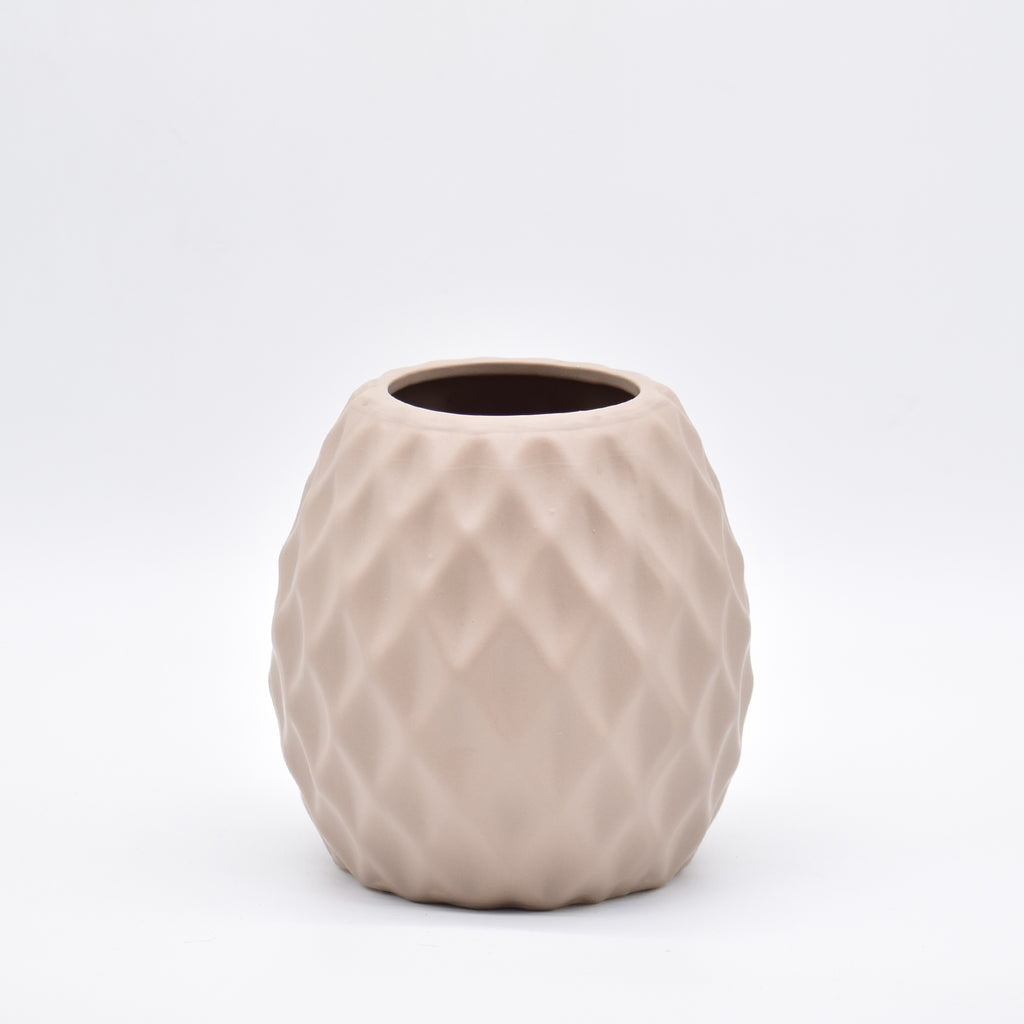 Delilah Cross modern ceramic vase with matte finish styled for luxury home décor with dried flowers in Indian interior setting