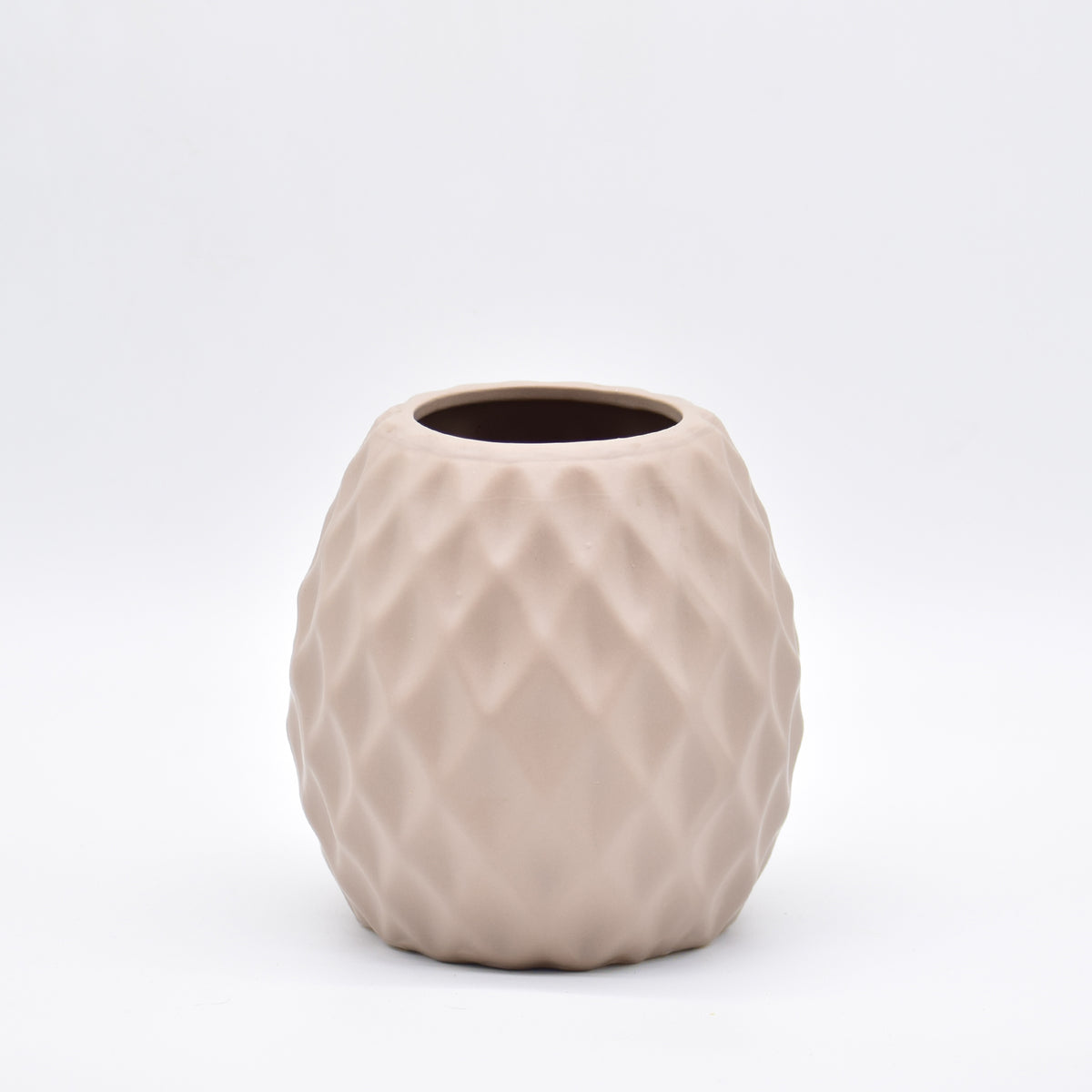 Delilah Cross modern ceramic vase with matte finish styled for luxury home décor with dried flowers in Indian interior setting