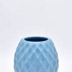 Delilah Cross modern ceramic vase with matte finish styled for luxury home décor with dried flowers in Indian interior setting