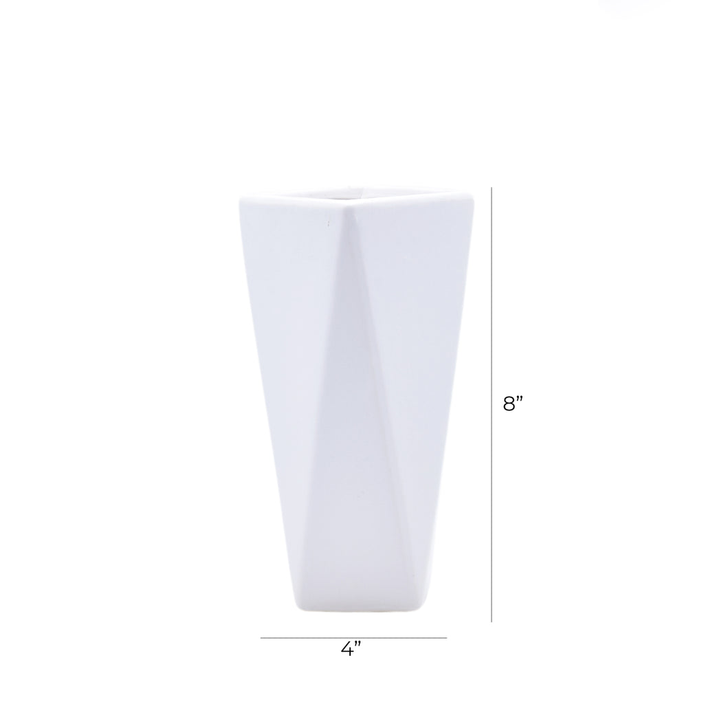 Modern geometric ceramic flower vase with yellow floral arrangement for luxury contemporary Indian home décor