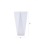 Modern geometric ceramic flower vase with yellow floral arrangement for luxury contemporary Indian home décor