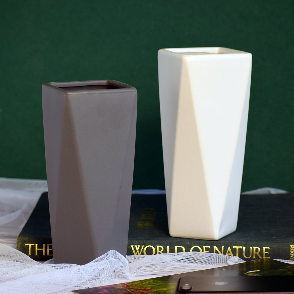 Modern geometric ceramic flower vase with yellow floral arrangement for luxury contemporary Indian home décor