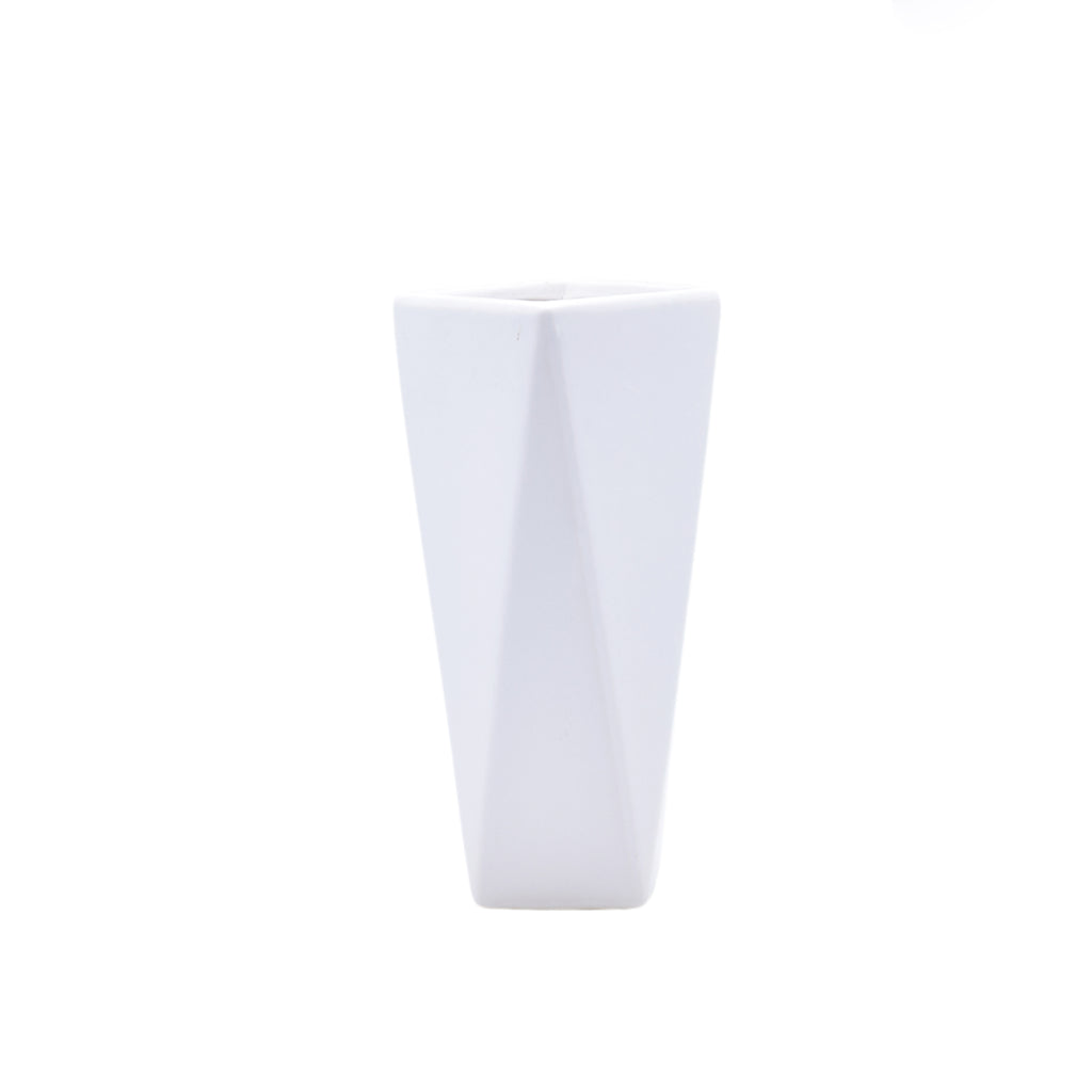Modern geometric ceramic flower vase with yellow floral arrangement for luxury contemporary Indian home décor