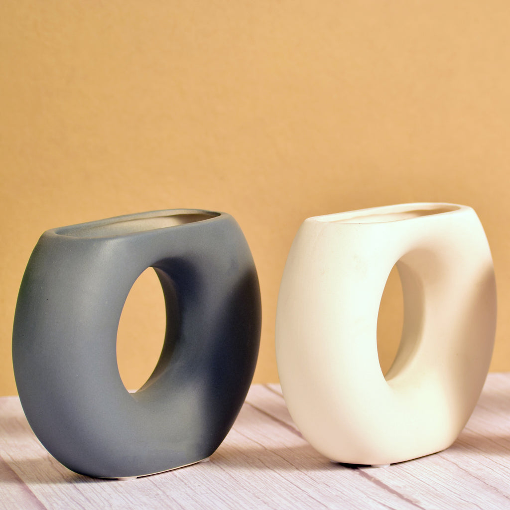 Morcee Half Donut Decorative Vase crafted from premium ceramic, styled in a modern luxury living room interior with contemporary home décor.