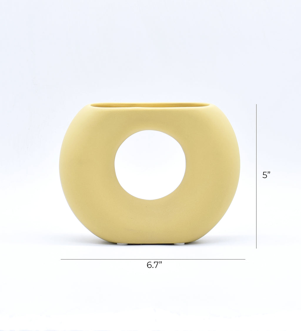 Morcee Half Donut Decorative Vase crafted from premium ceramic, styled in a modern luxury living room interior with contemporary home décor.