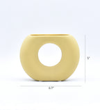Morcee Half Donut Decorative Vase crafted from premium ceramic, styled in a modern luxury living room interior with contemporary home décor.