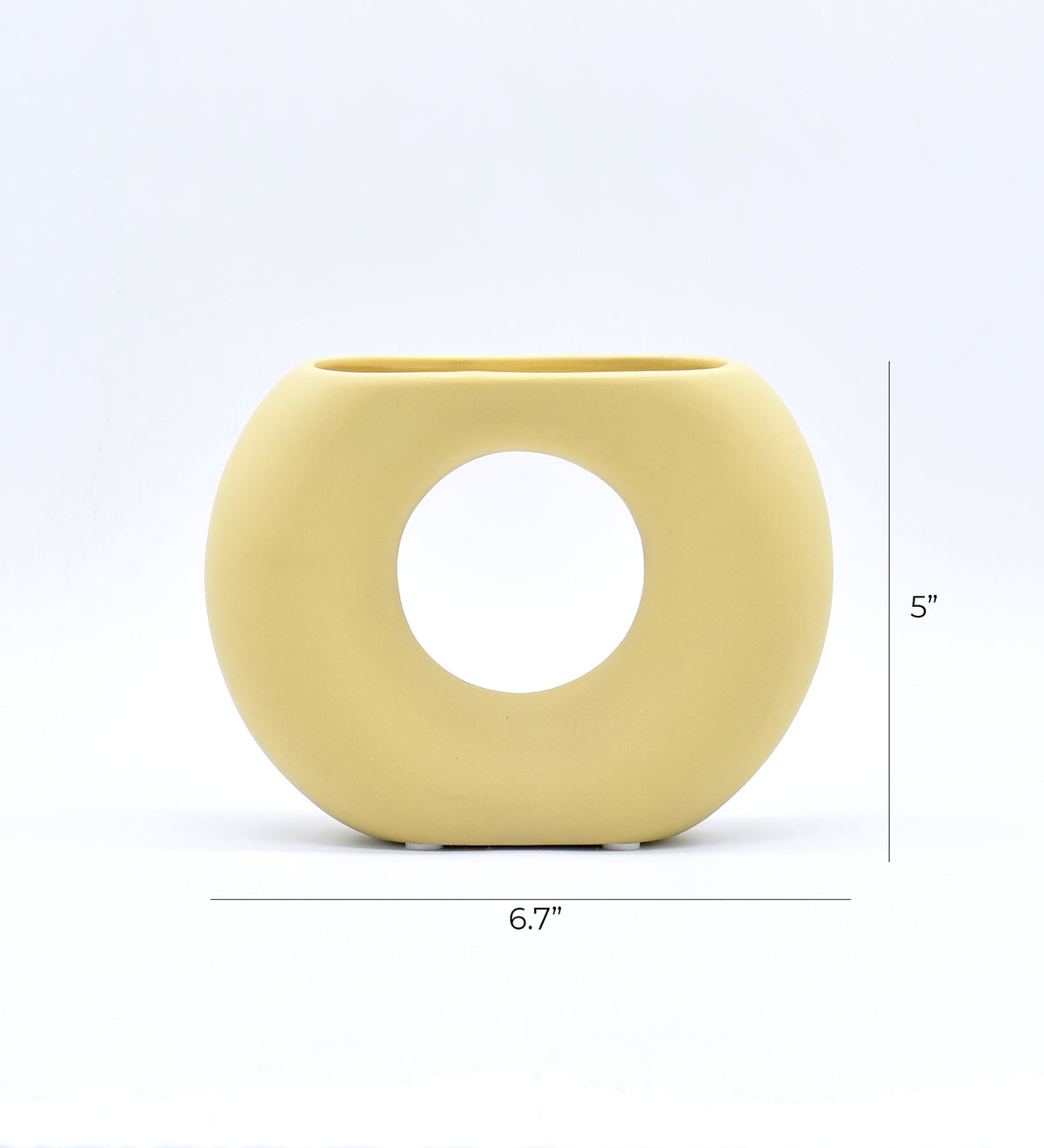 Morcee Half Donut Decorative Vase crafted from premium ceramic, styled in a modern luxury living room interior with contemporary home décor.