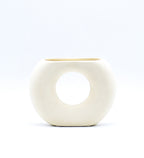 Morcee Half Donut Decorative Vase crafted from premium ceramic, styled in a modern luxury living room interior with contemporary home décor.