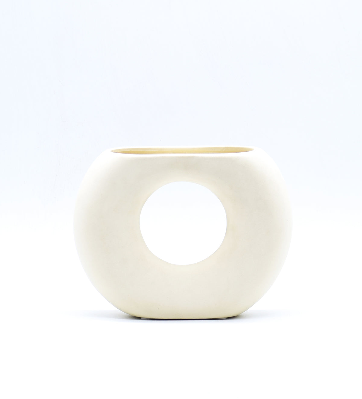 Morcee Half Donut Decorative Vase crafted from premium ceramic, styled in a modern luxury living room interior with contemporary home décor.