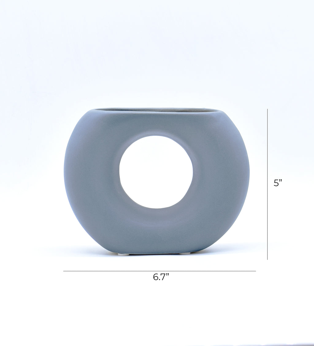 Morcee Half Donut Decorative Vase crafted from premium ceramic, styled in a modern luxury living room interior with contemporary home décor.