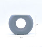 Morcee Half Donut Decorative Vase crafted from premium ceramic, styled in a modern luxury living room interior with contemporary home décor.