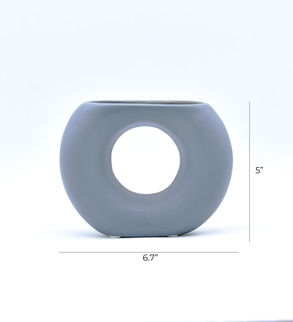 Morcee Half Donut Decorative Vase crafted from premium ceramic, styled in a modern luxury living room interior with contemporary home décor.