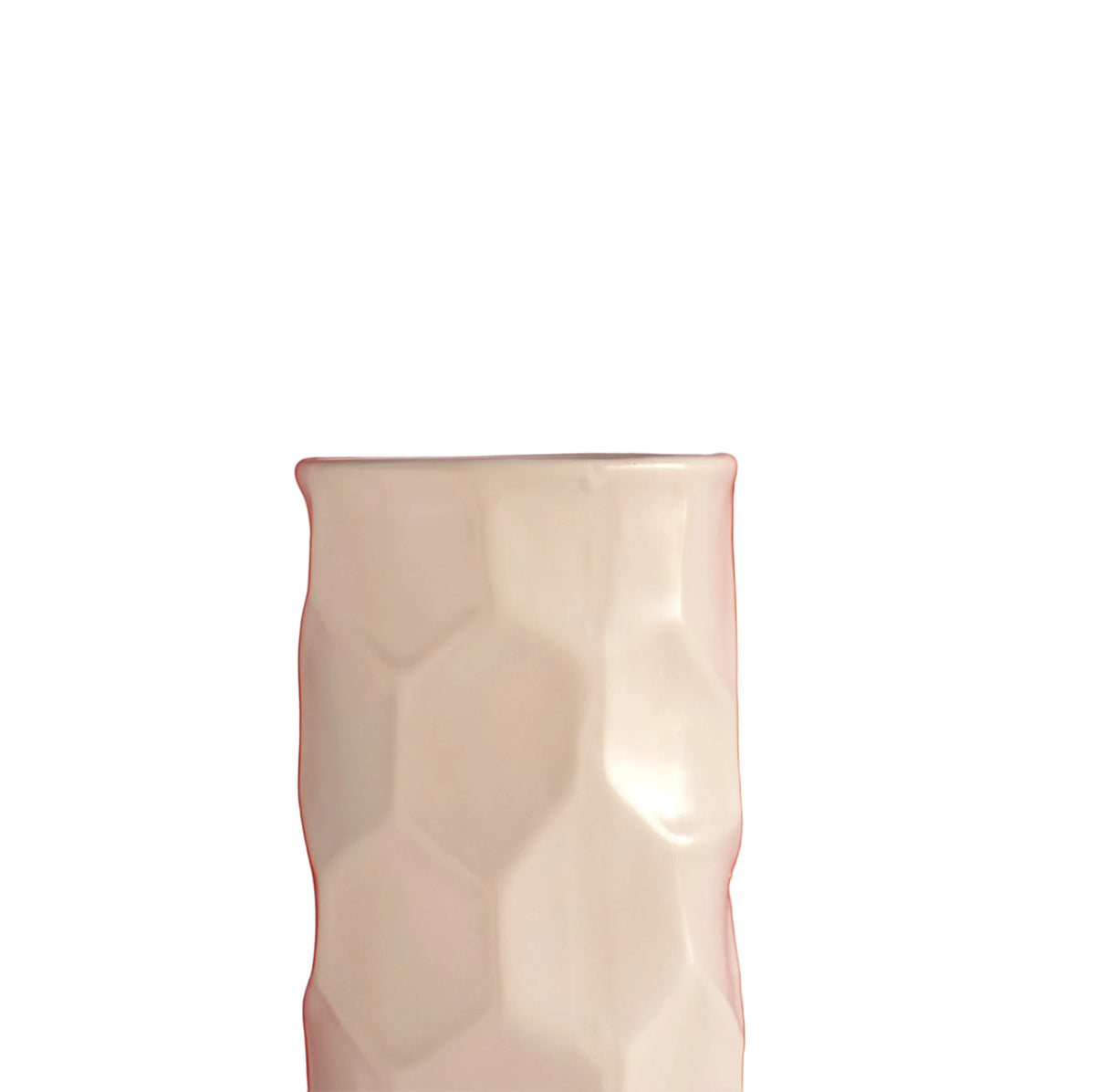 Luxury beige honeycomb ceramic flower vase with white flowers styled on a wooden console table in a modern minimalist living room interior.