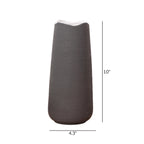 Elegant black ceramic flower vase with white floral arrangement on minimal background