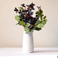 minimalist flower vase with white artificial flowers for modern home décor in India