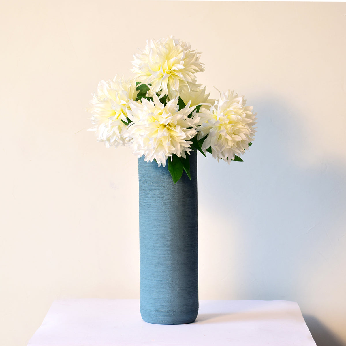 Luxury modern ceramic flower vase styled in a contemporary living room with elegant home décor, minimalist interiors, and premium decorative accents.