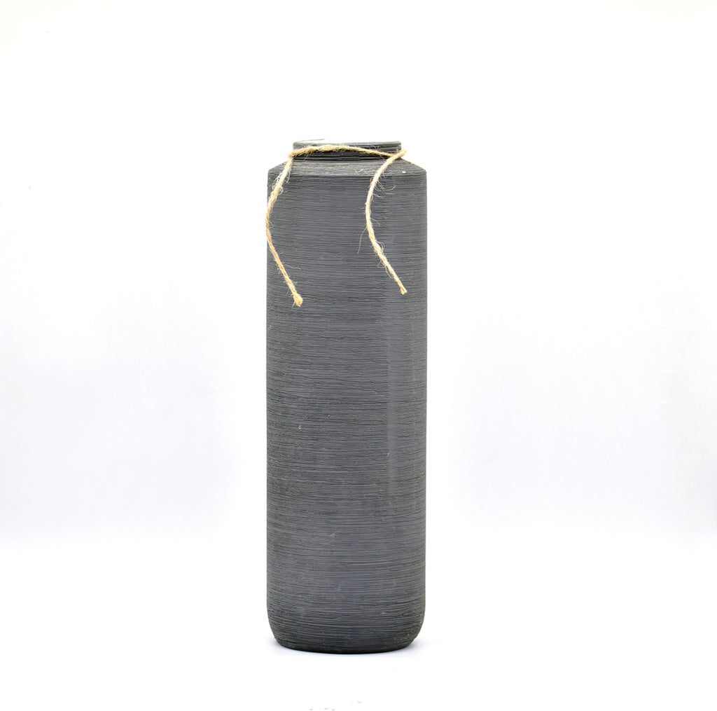 Luxury modern ceramic flower vase styled in a contemporary living room with elegant home décor, minimalist interiors, and premium decorative accents.