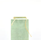 Luxury modern ceramic flower vase styled in a contemporary living room with elegant home décor, minimalist interiors, and premium decorative accents.