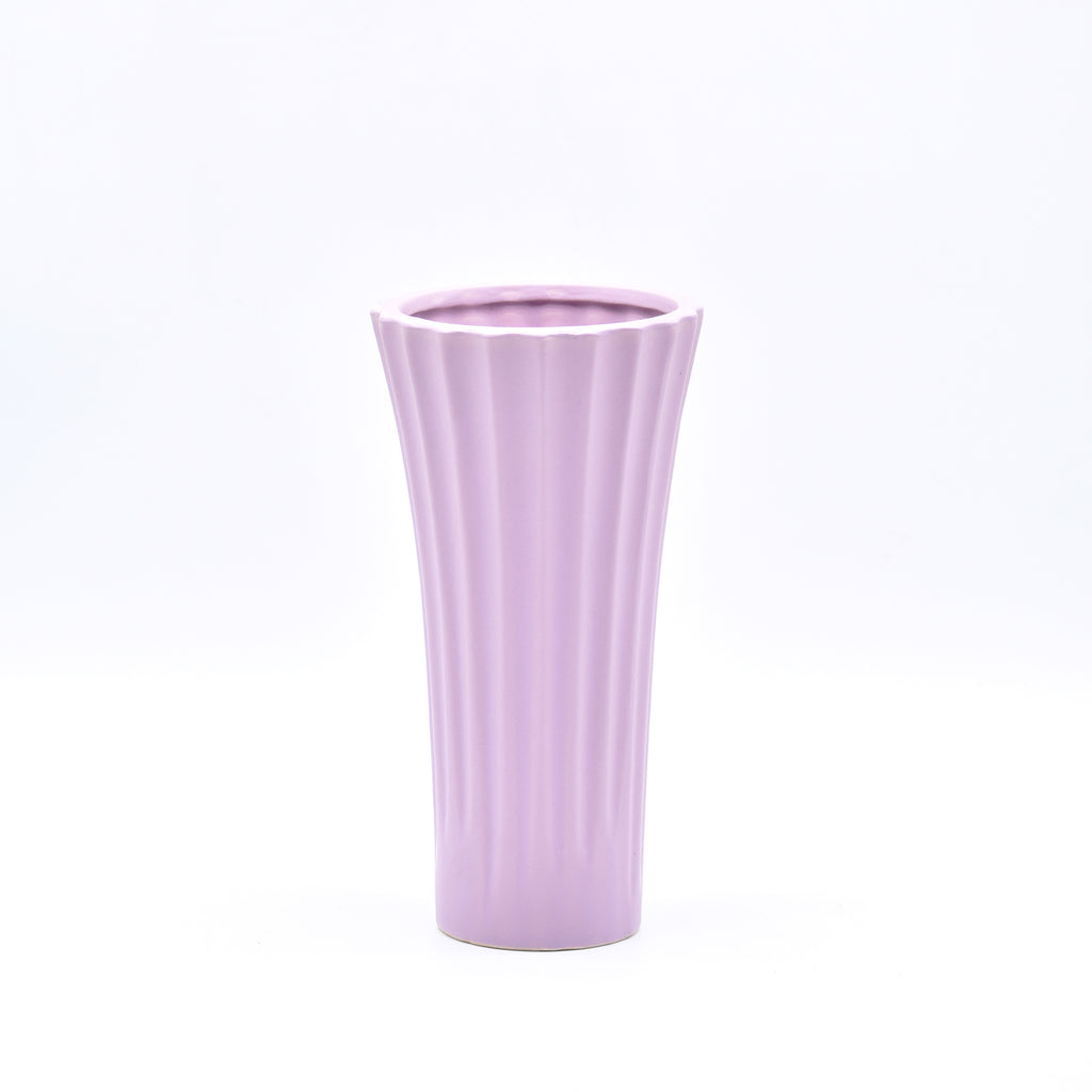 Sky blue ribbed ceramic flower vase with yellow flowers for modern luxury home décor and contemporary interior styling in India
