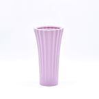 Sky blue ribbed ceramic flower vase with yellow flowers for modern luxury home décor and contemporary interior styling in India