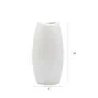 Luxury ceramic vase set with elegant floral styling displayed in a modern contemporary living room with premium home décor accents.