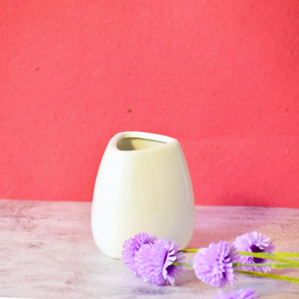 Luxury ceramic vase set with elegant floral styling displayed in a modern contemporary living room with premium home décor accents.
