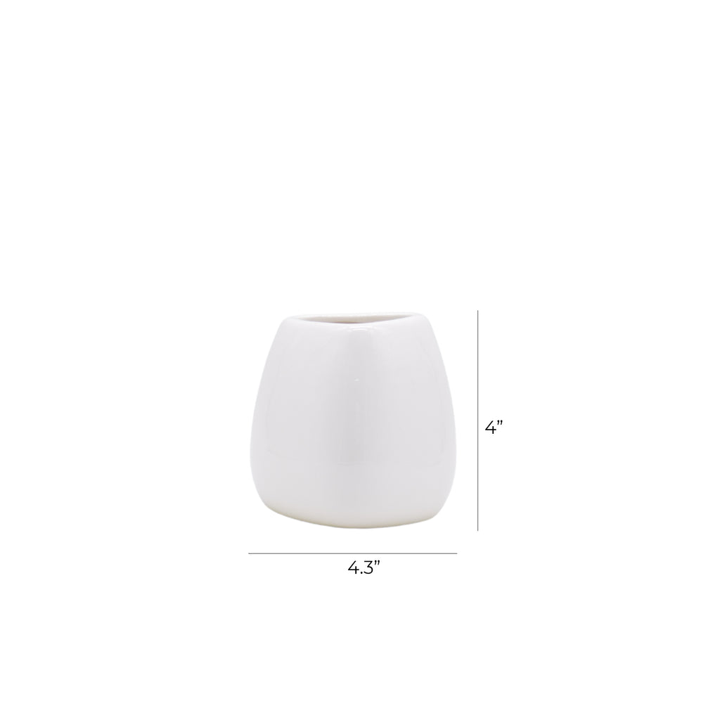 Luxury ceramic vase set with elegant floral styling displayed in a modern contemporary living room with premium home décor accents.