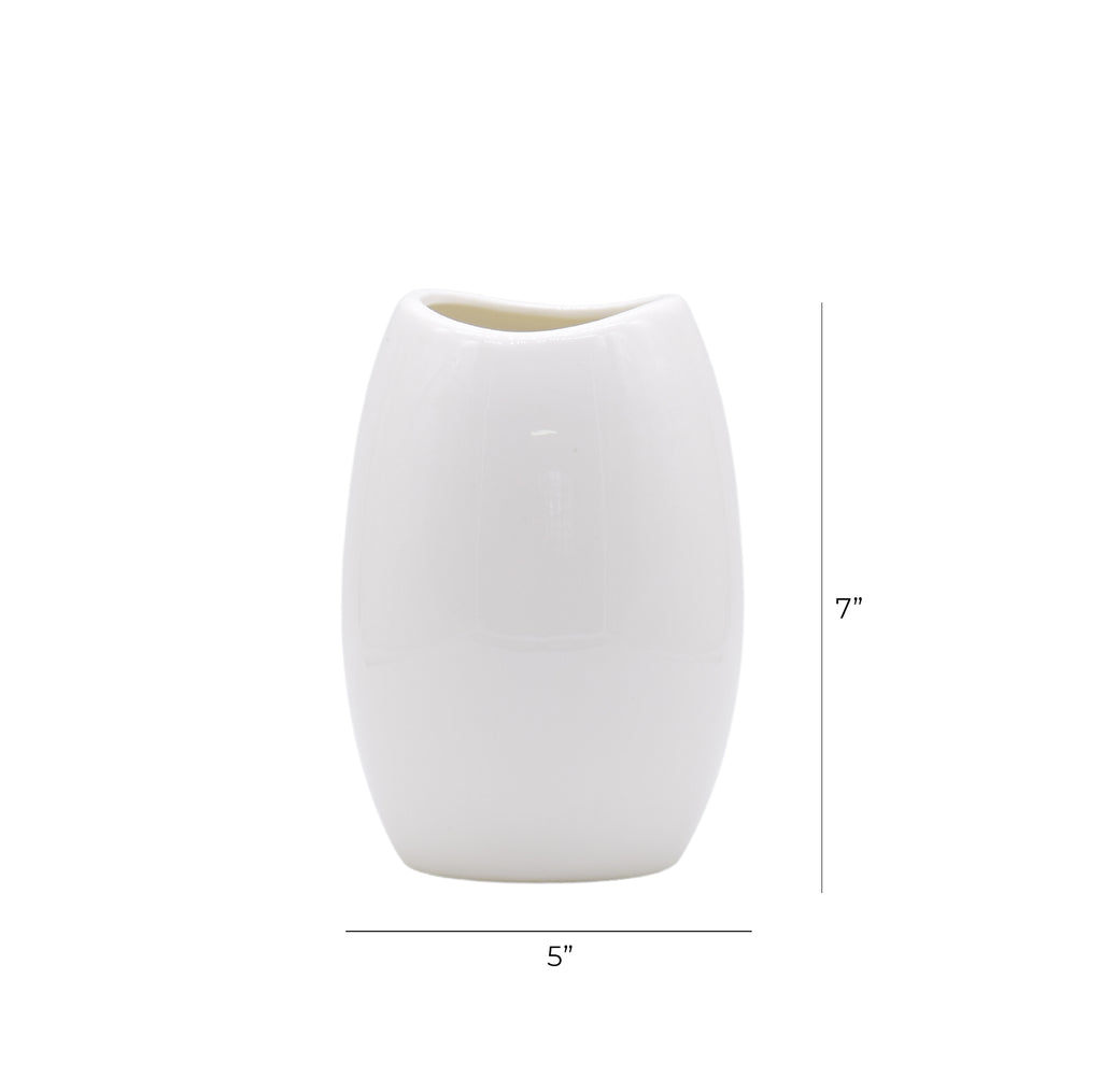Luxury ceramic vase set with elegant floral styling displayed in a modern contemporary living room with premium home décor accents.