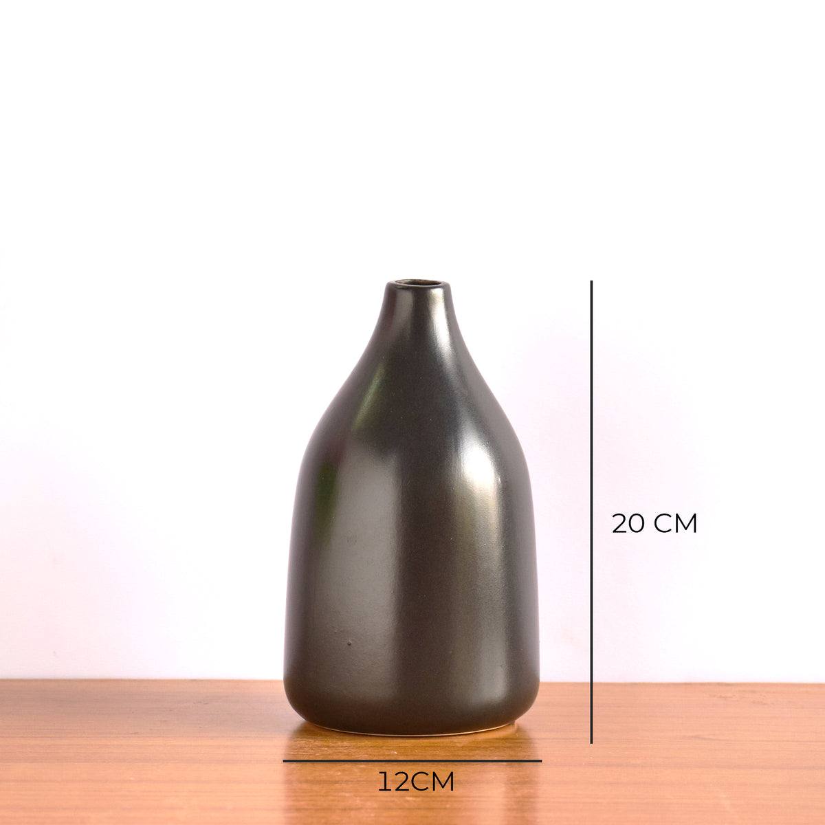 Nordic Linear VaseMinimal black ceramic flower vase with red floral arrangement on boho minimalistic background 