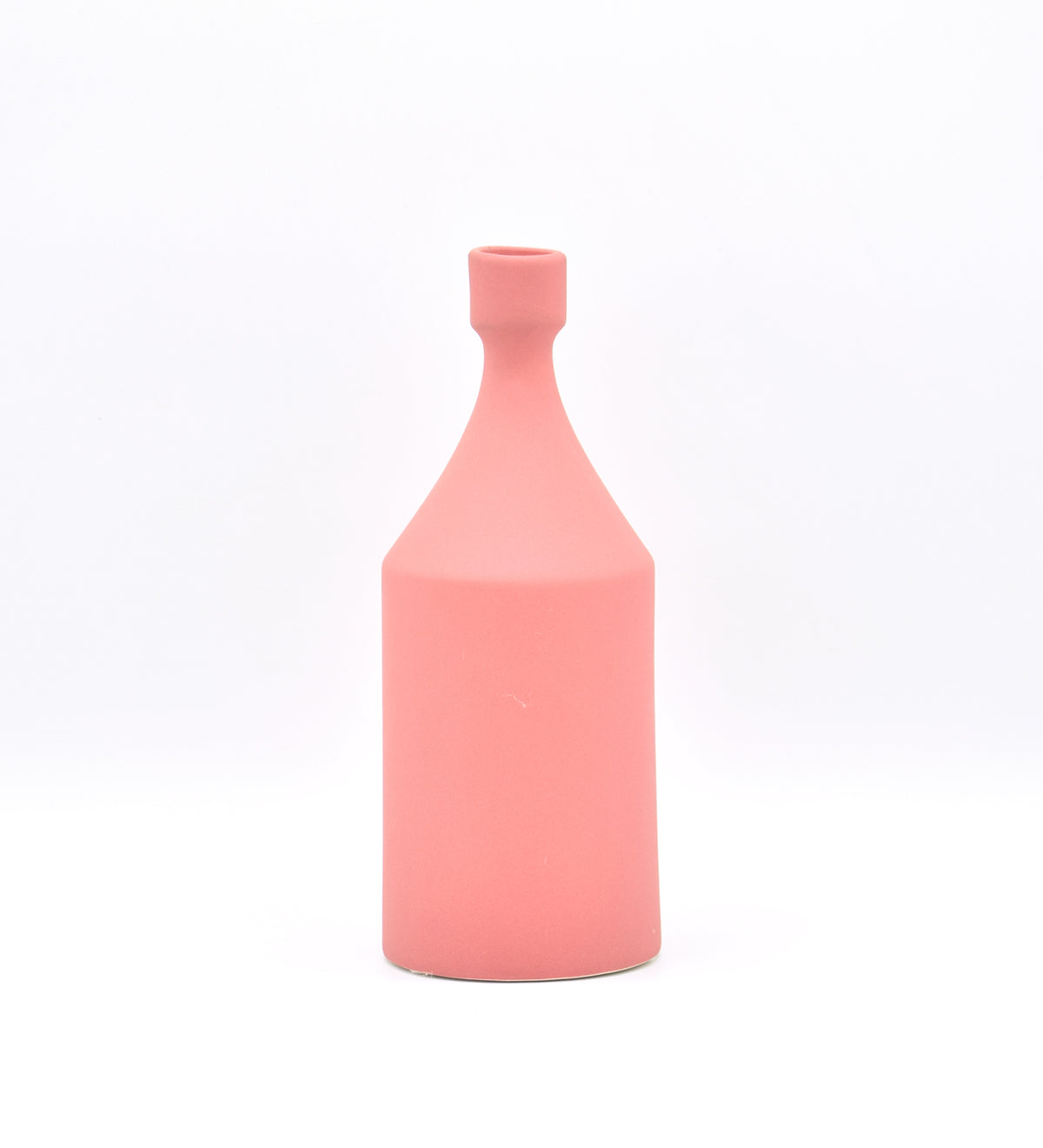 Luxury ceramic bottle-shaped vase with matte finish styled on a beige travertine console table in a modern Scandinavian-inspired interior with olive branches and minimalist décor.