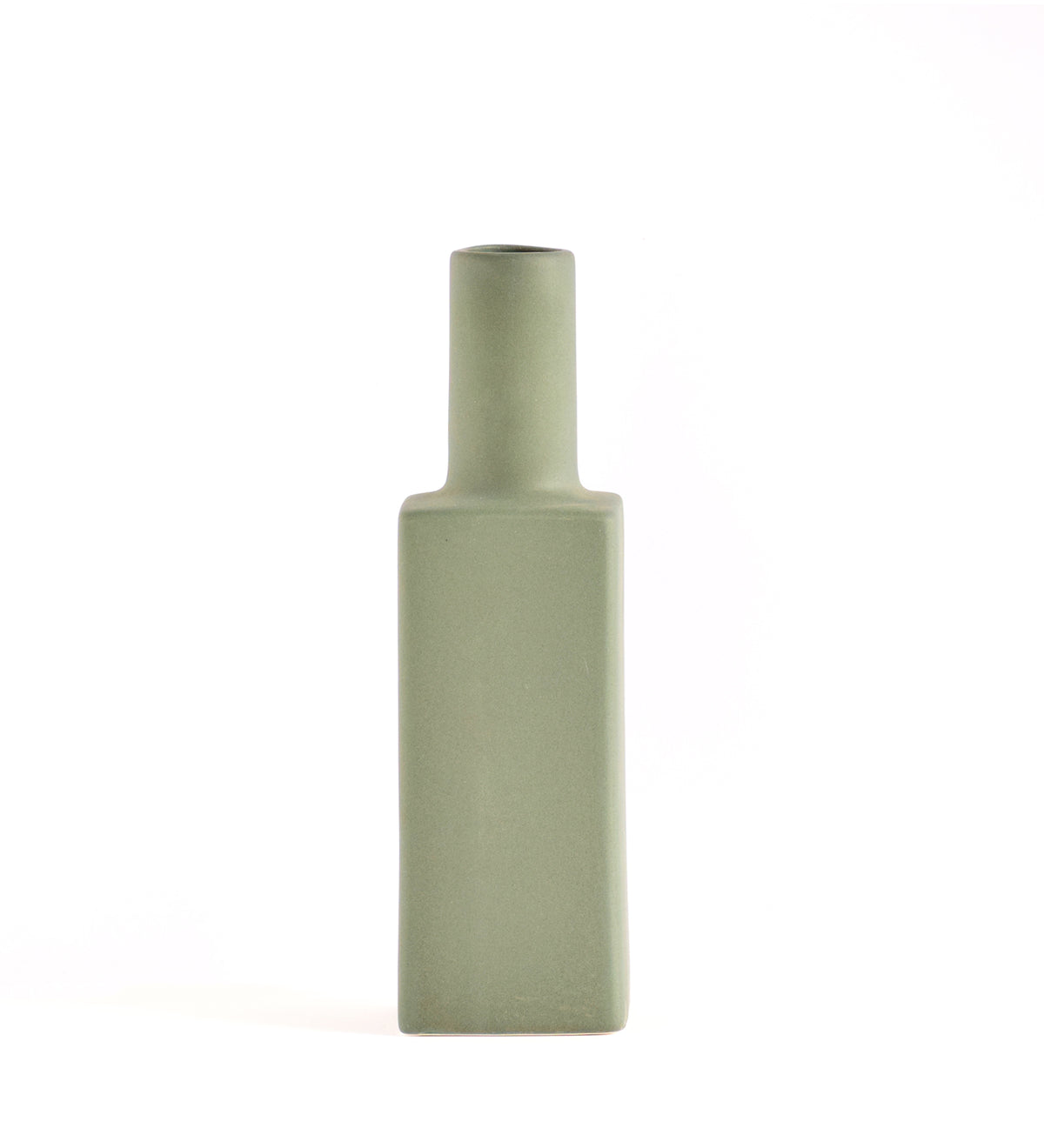 Luxury ceramic bottle-shaped vase with matte finish styled on a beige travertine console table in a modern Scandinavian-inspired interior with olive branches and minimalist décor.